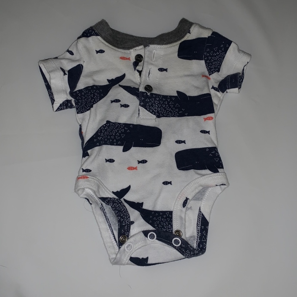 Carters newborn, never worn. No stains!